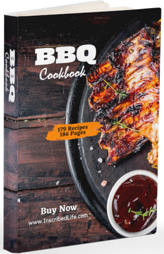 A mockup of a book cover displaying a black plate with BBQ ribs and sauce against a dark wood grain surface