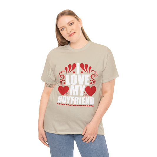 A woman smiling and wearing the I Love My Boyfriend Graphic T-shirt in sand (beige)