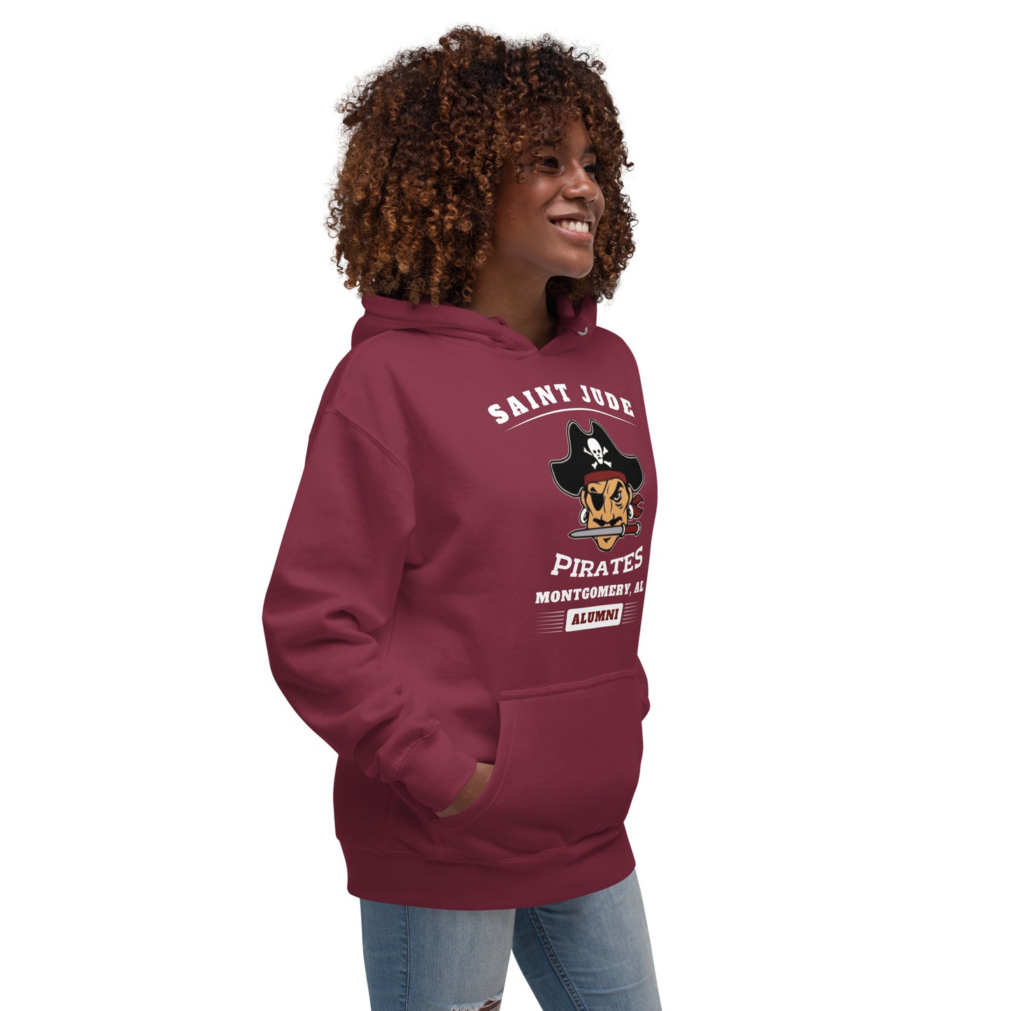 A lady standing at an angle and wearing a maroon Saint Jude High School Hoodie