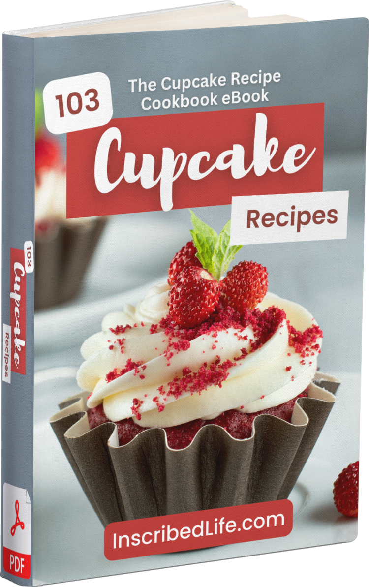 A mockup of the Cupcake Recipe Cookbook eBook displaying a red velvet cupcake with strawberry on top