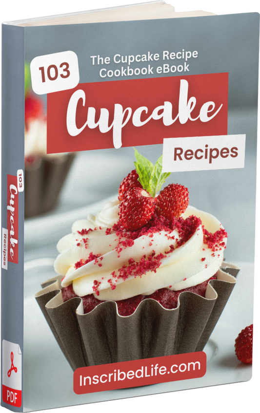 A mockup of the Cupcake Recipe Cookbook eBook displaying a red velvet cupcake with strawberry on top