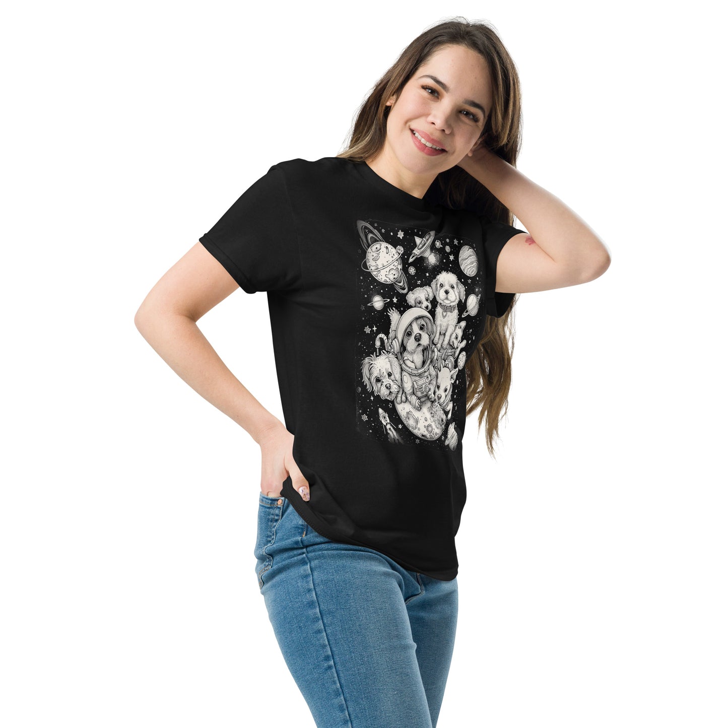 A woman smiling, standing at an angle  and wearing the Dogs in Space Graphic Tee Shirt in black with her hand in back of her head