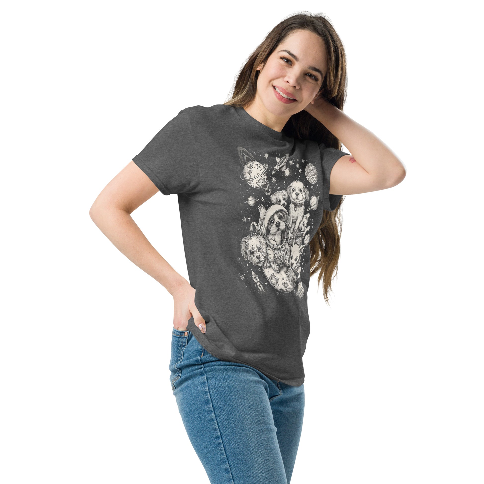 A woman smiling, standing at an angle, and wearing the Dogs in Space Graphic Tee Shirt in dark heather with her hand behind her head