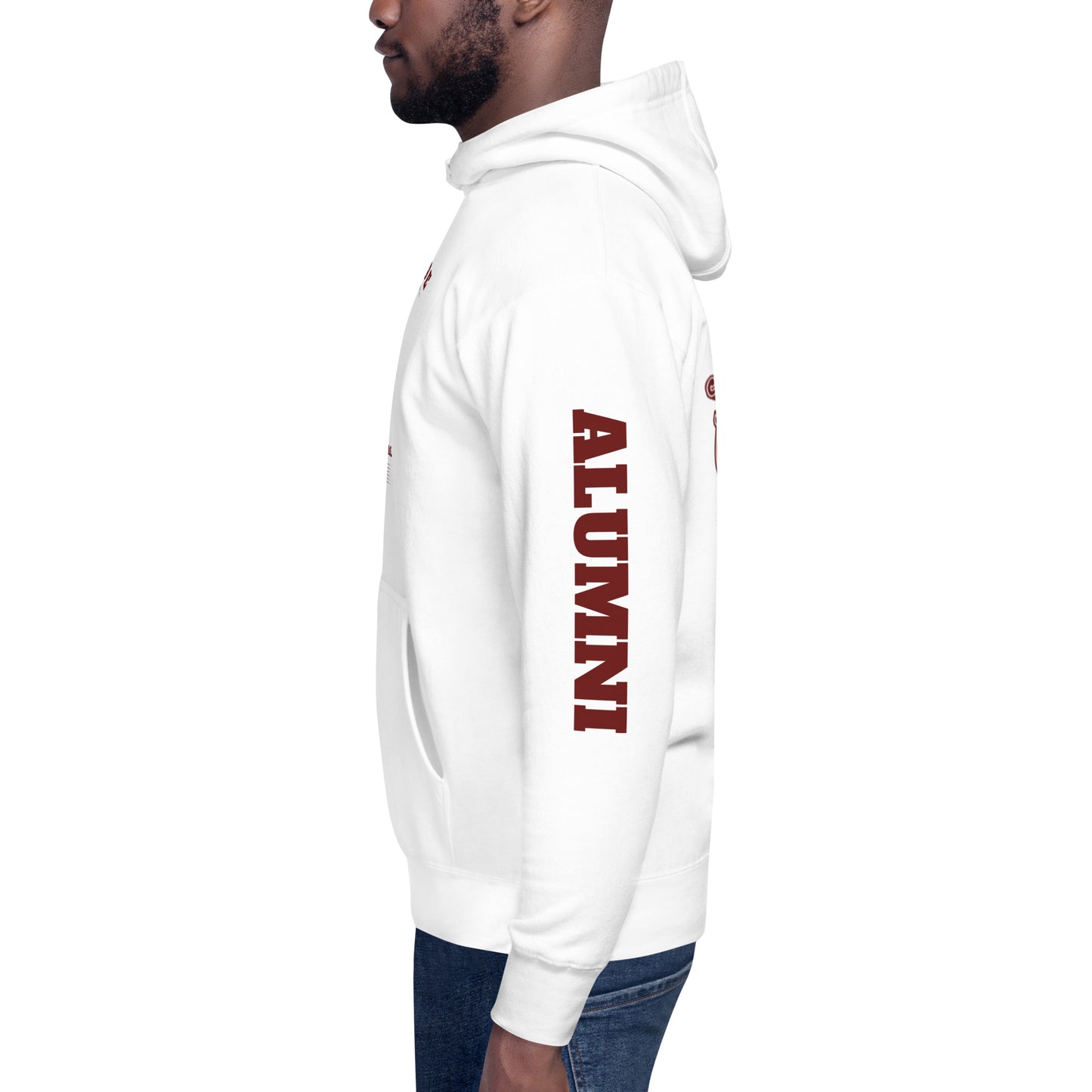 A man wearing a white St. Jude Hoodie displaying the left side reading, "Alumni"